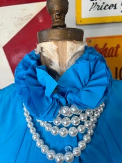 Blue Sleeveless Dress with Ruffle Neckline
